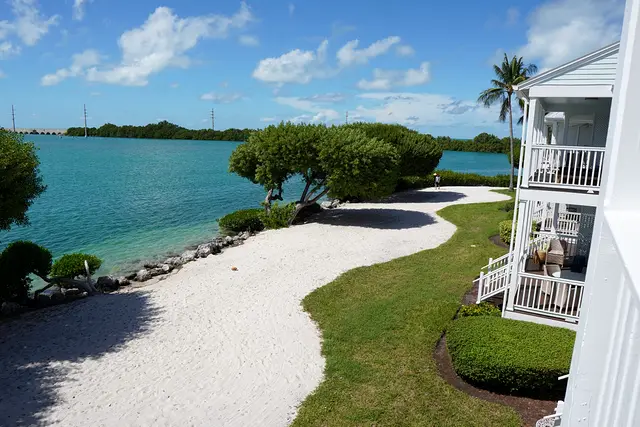 The curved sand beach at Hawks Cay Village, with the villas alongside