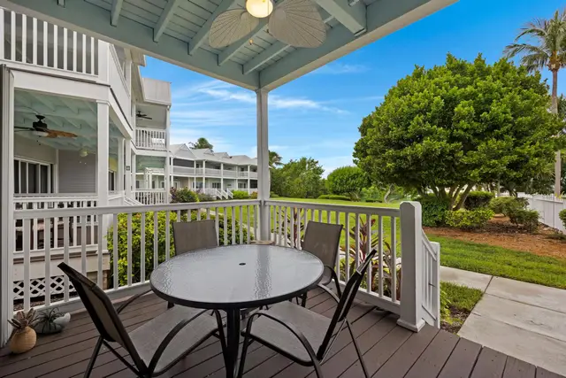 Porch at villa 5092 with a dining table and chairs